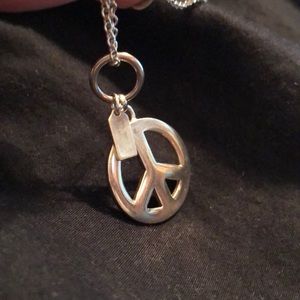 Coach peace necklace